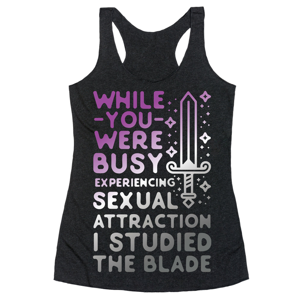 While You Were Busy Experiencing Sexual Attraction Racerback Tank