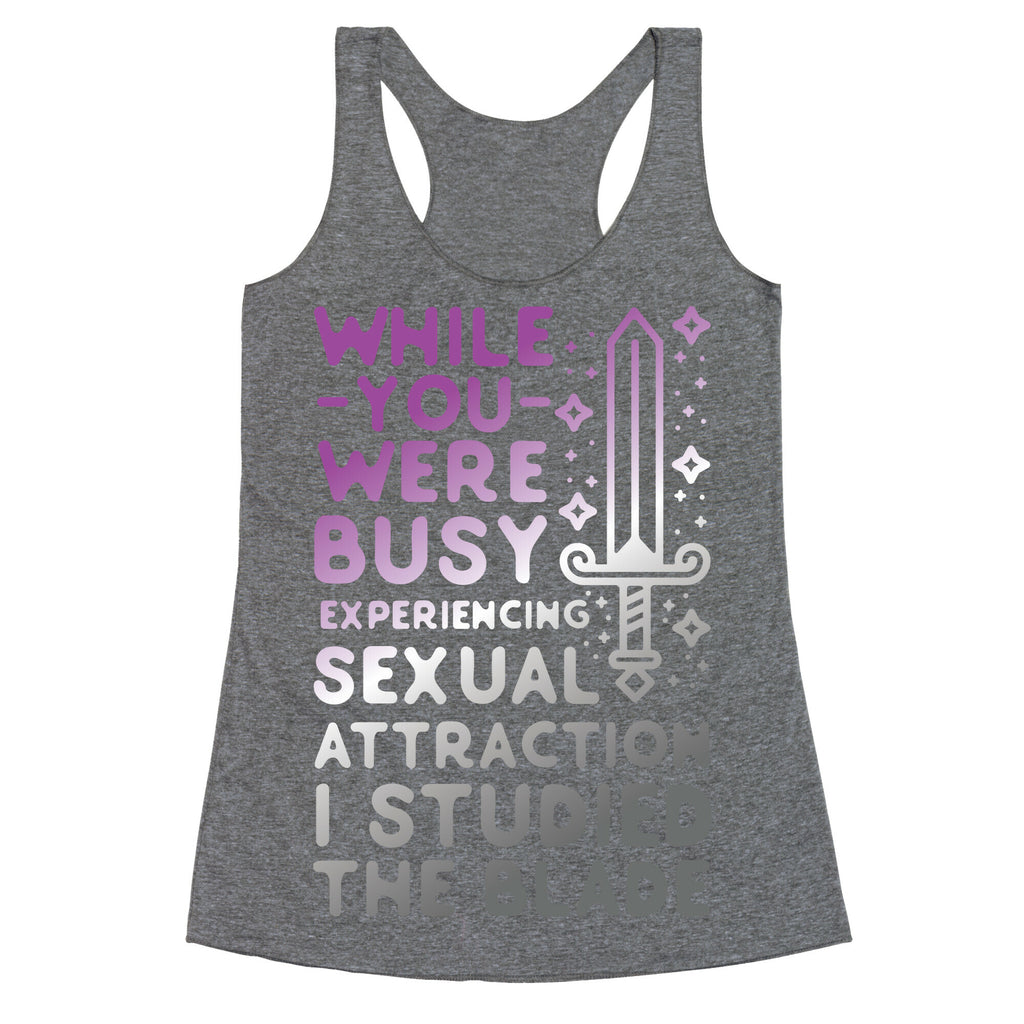 While You Were Busy Experiencing Sexual Attraction Racerback Tank