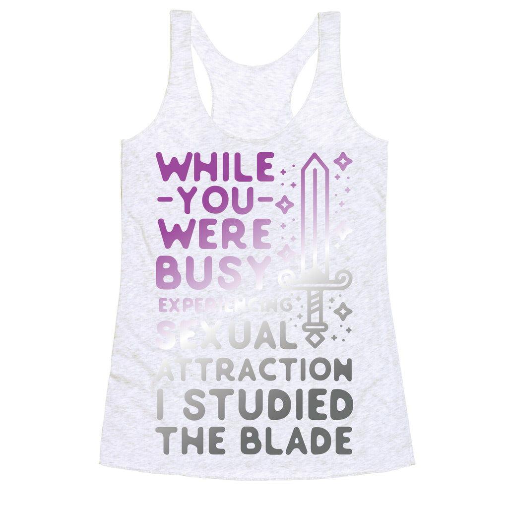 While You Were Busy Experiencing Sexual Attraction Racerback Tank